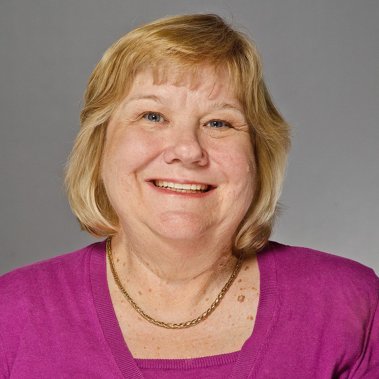 woman with short blonde hair