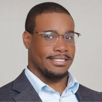 black man with beard and glasses