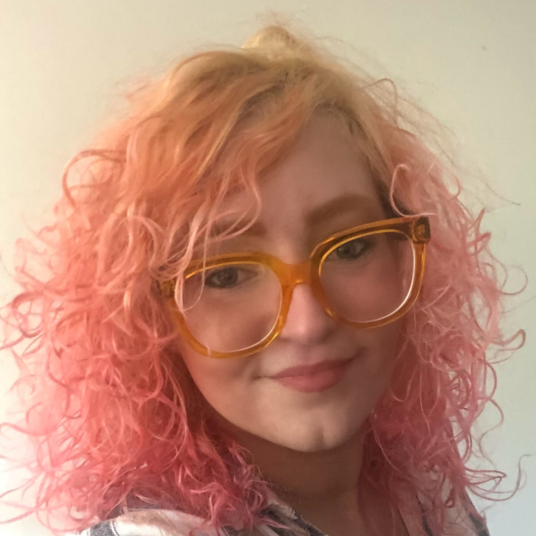 woman with glasses and red hair